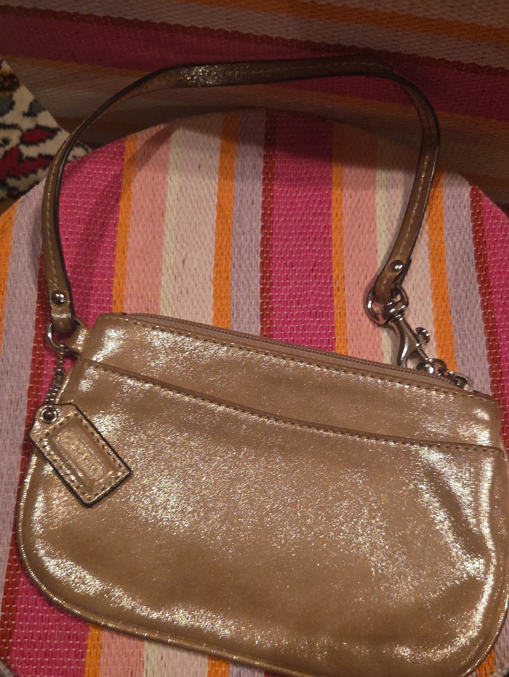 Coach small gold clutch